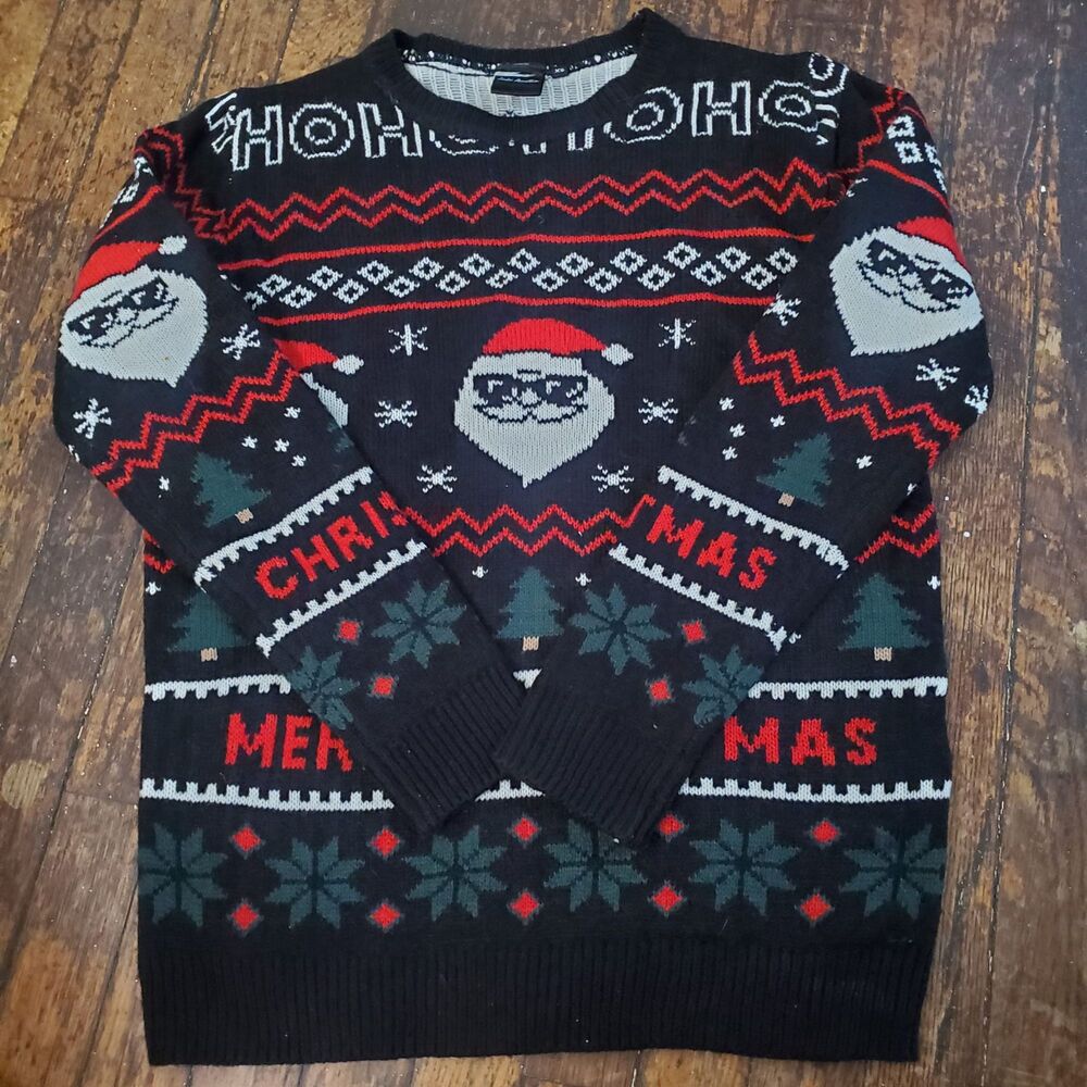 Christmas sweater featuring Santa Claus graphics